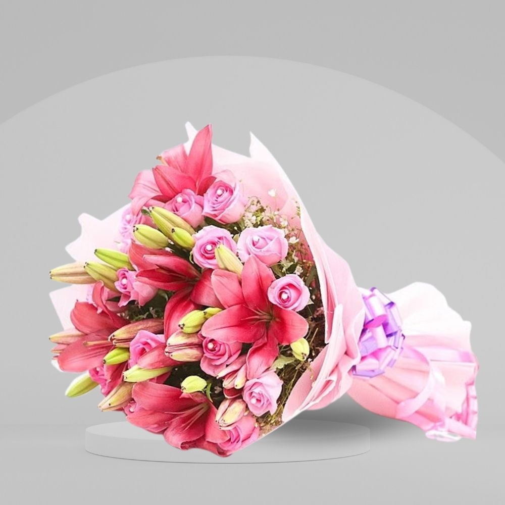 pink rose and lilies with pink paper 