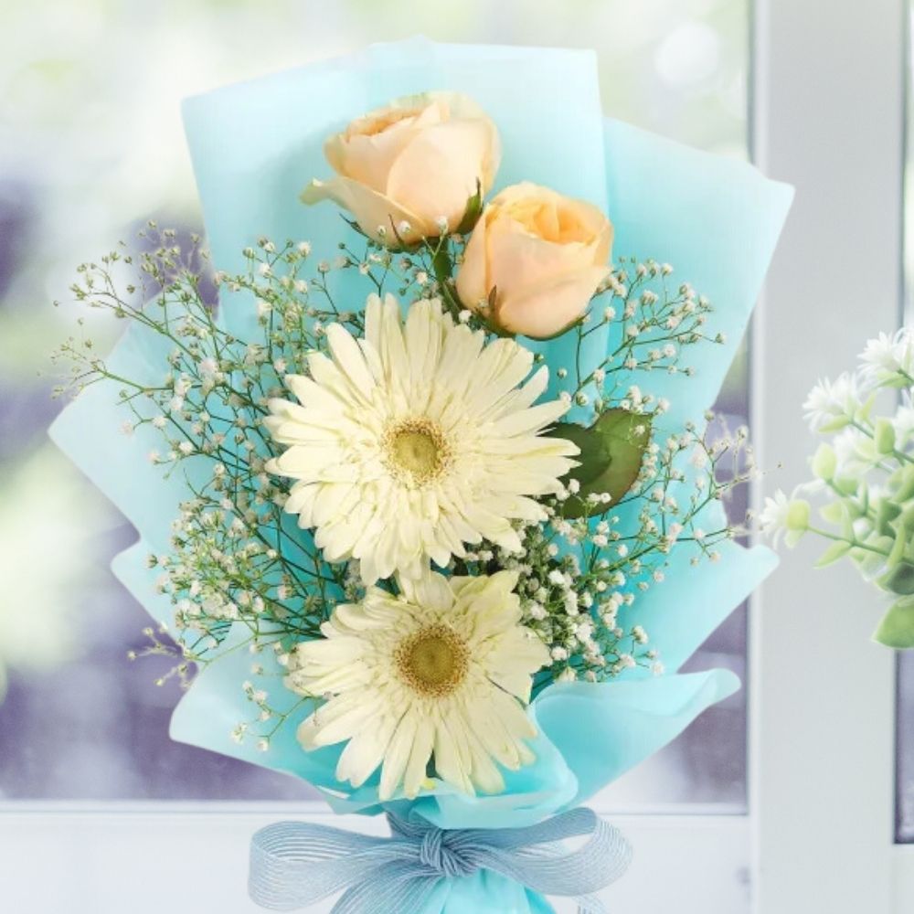 The white gerbera and white rose bouquet 