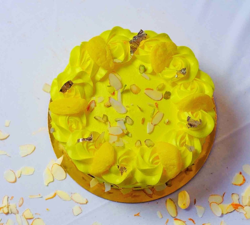 Rasmalai cake and yellow rose bouquet 